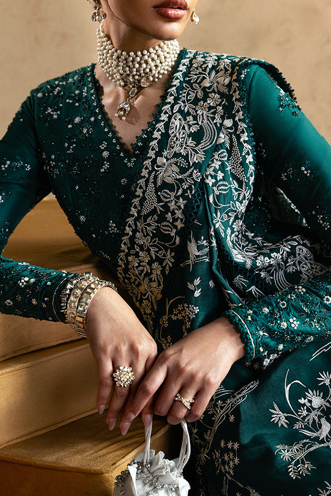Close-up of Suffuse Amarien embellished neckline and teal silk drape